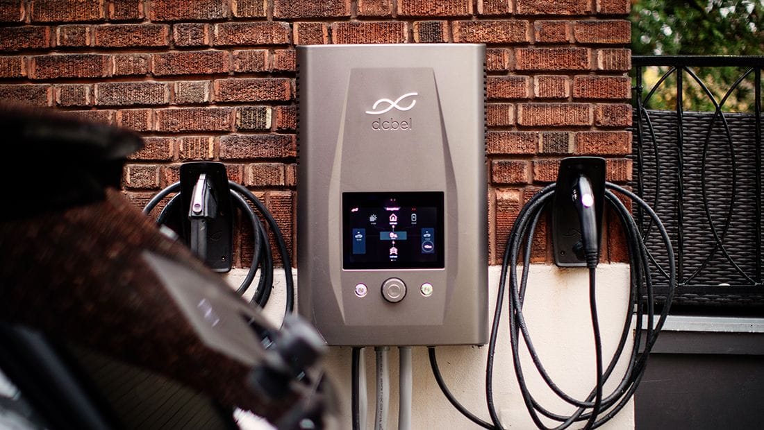 dcbel Ara Home Energy Station on a brick wall