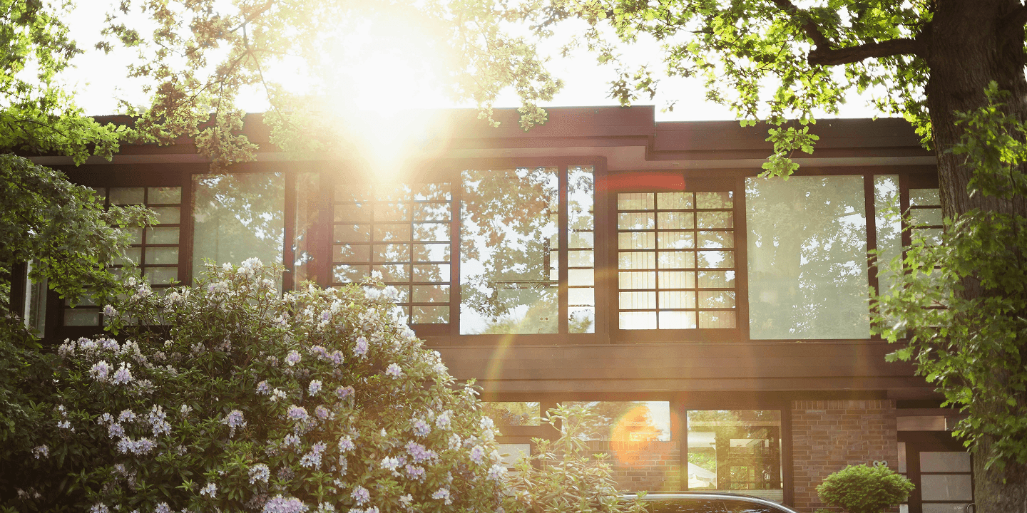 A house with windows bathed in sunlight