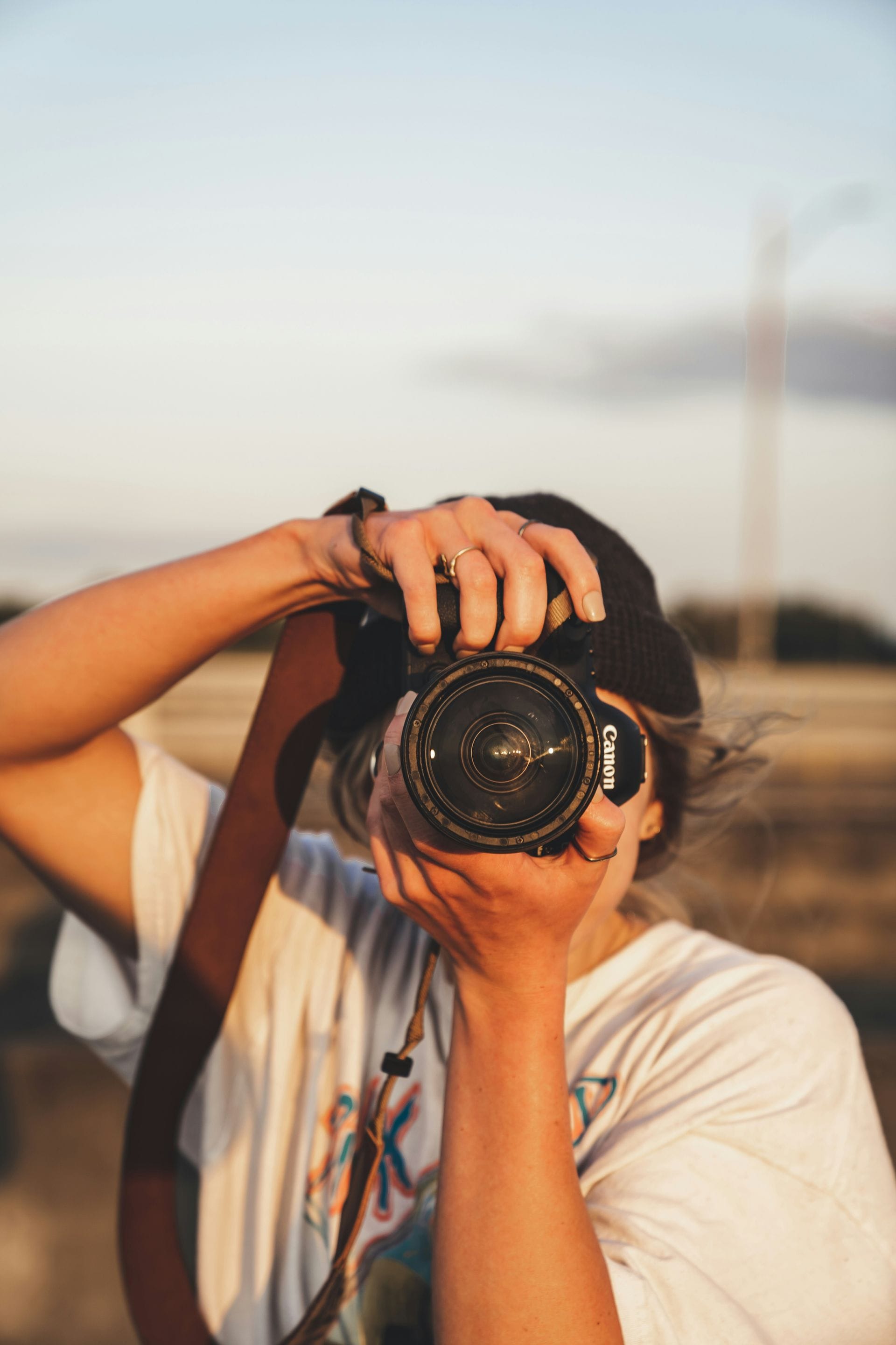 Man capturing image with camera
